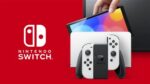 Nintendo Switch (modelo OLED) con base y mandos Joy-Con blancos. - Imagen 4