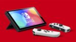 Nintendo Switch (modelo OLED) con base y mandos Joy-Con blancos. - Imagen 6